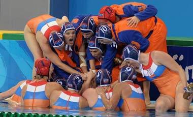 Players of the Netherlands cheer for themselves during the women's gold medal match between the Netherlands and the United States of the Beijing 2008 Olympic Games water polo event at Yingdong Natatorium of National Olympic Sports Center in Beijing, China, August 21, 2008. The Netherlands beat the United States 9-8 and grabbed the gold medal in this event.(Xinhua Photo)