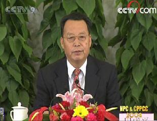 Tian Chengping, Minister of Labor and Social Security.