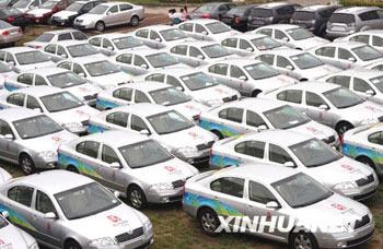 A fleet of one hundred cars are on display at Beijing's Asian Games Village Auto Trade Market on Sunday, September 7, 2008, gearing up for a upcoming auto auction. The cars, all SKODA Octavia 1.6L models, were mainly used in services affiliated to the Beijing Olympic Games and have attracted crowds of visitors. [Photo: Xinhuanet]