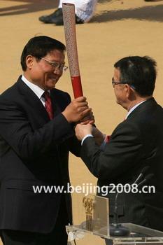 The Olympic flame was handed over to Liu Qi, president of the Beijing Organizing Committee of the 2008 Olympic Games March 30, 2008.
