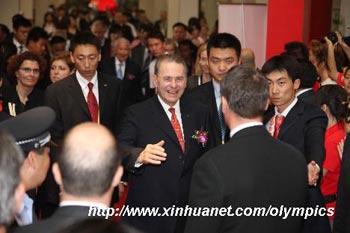 International Olympic Committee (IOC) President Jacques Rogge (C) attends the opening of Olympic Expo Beijing 2008 in Beijing Exhibition Center in Beijing, capital of China, Aug. 8, 2008. (Xinhua/Zhang Yanhui)
