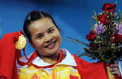 Chen Xiexia wins China 1st gold medal at Beijing Olympics