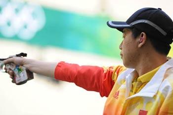 Pang Wei of China prepares to shoot during men's 10m air pistol qulification of Beijing Olympic Games at Beijing Shooting Range Hall in Beijing, China, Aug. 9, 2008. Pang Wei won the gold medal in men's 10m air pistol final. (Xinhua/Jiao Weiping) 