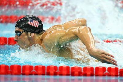 Michael Phelps of America competes during the men's 400m individual medley final of the Beijing 2008 Olympic Games at National Aquatics Center in Beijing, China, August 10, 2008. Michael Phelps won in a world record time of 4:03.84. (Xinhua/Chen Kai)