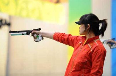 Guo Wenjun of China attends the women's 10m air pistol qualification of shooting at Beijing 2008 Olympic Games in Beijing, China, Aug. 10, 2008. Guo ranked the second and entered the final of this event. (Xinhua/Bao Feifei) 