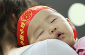 Baby fans watch Beijing Games