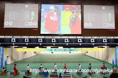 (Shooters compete during men's 50m pistol final of the Beijing 2008 Olympic Games shooting event in Beijing, China, Aug. 12, 2008. (Xinhua)