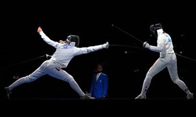 Britta Heidemann (L) of Germany competes during the women's individual epee final of fencing against Ana Maria Branza of Romania at Beijing 2008 Olympic Games in Beijing, China, Aug. 13, 2008. Heidemann won the match 15-11 and claimed the title in this event. (Xinhua/Li Ga)