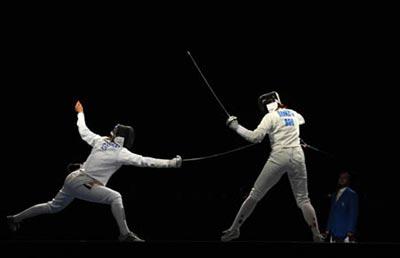 Britta Heidemann (L) of Germany competes during the women's individual epee final of fencing against Ana Maria Branza of Romania at Beijing 2008 Olympic Games in Beijing, China, Aug. 13, 2008. Heidemann won the match 15-11 and claimed the title in this event. (Xinhua/Yang Lei)