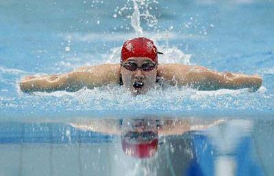 Liu Zige of China competes during the final of women's 200m butterfly at the Beijing 2008 Olympic Games in the National Aquatics Center, also known as the Water Cube in Beijing, China, Aug. 14, 2008. Liu Zige won the gold medal in a new world record with 2 minutes 04.18 seconds. (Xinhua/Fan Jun)