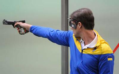 Oleksandr Petriv of Ukraine competes during Men's 25m Rapid Fire Pistol Final of the Beijing 2008 Olympic Games Shooting event in Beijing, China, Aug. 16, 2008. He won the gold medal in the event. (Xinhua/Li Ga)