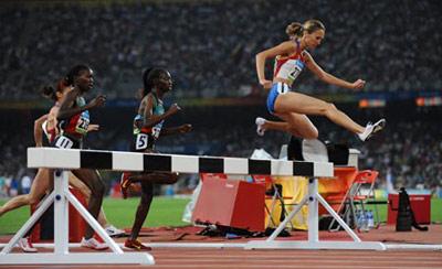 Gulnara Galkina-Samitova (R) of Russia competes in women's 3000m steeplechase final at the National Stadium, also known as the Bird's Nest, during Beijing 2008 Olympic Games in Beijing, China, Aug. 17, 2008. claimed the title of the event and broke the world record.(Xinhua Photo)