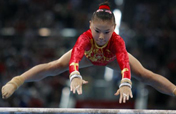 Chinese gymnast He Kexin wins uneven bars gold