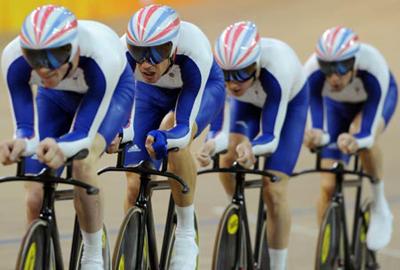 The team of Great Britain competes during the men's team pursuit first round of the cycling-track event during the Beijing 2008 Olympic Games at the Laoshan Velodrome in Beijing, China, Aug. 17, 2008. The British team broke the world record. (Xinhua Photo)