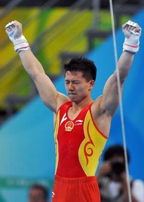 China's Chen Yibing gestures after performing on the rings during gymnastics artistic apparatus finals of Beijing 2008 Olympic Games at National Indoor Stadium in Beijing, China, Aug. 18, 2008. Chen Yibing claimed the title of the event with a score of 16.600. (Xinhua/Wang Lei)