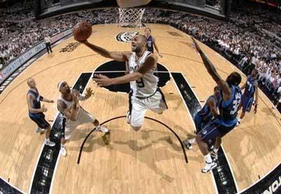 Tony Parker of the San Antonio Spurs shoots against the Dallas Mavericks in Game Two of the Western Conference Quarterfinals during the 2009 NBA Playoffs at the AT&T Center, on April 20, in San Antonio, Texas. The Spurs won 105-84 to tie the best-of-seven series 1-1.(AFP/NBAE/Getty Images/D. Clarke Evans) 