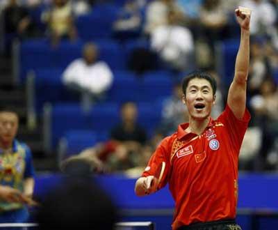 China's Wang Liqin celebrates during the men's singles semifinal against his compatriot Ma Lin at the World Table Tennis Championships in Yokohama, Japan, on May 4, 2009. Wang won 4-3 (11-5,12-14,11-9,7-11,11-9,6-11,11-6) and advanced to the final.(Xinhua/Bi Mingming)