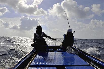 白領放棄高薪登西沙島嶼當漁民蓋木屋釣魚潛水