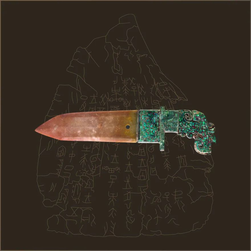 玉援銅內戈，通長27.8厘米，玉援長15.8厘米，國家博物館藏